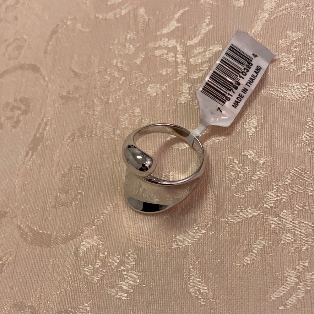 Beautiful ladies Platinum over sterling silver polish bypass ring, size 7,  $100 - Picture 4 of 4